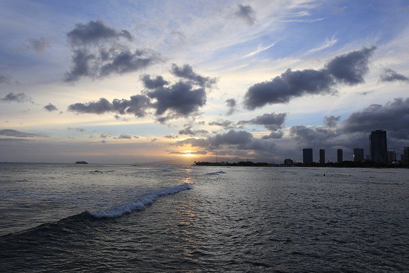 cityscape behind ocean